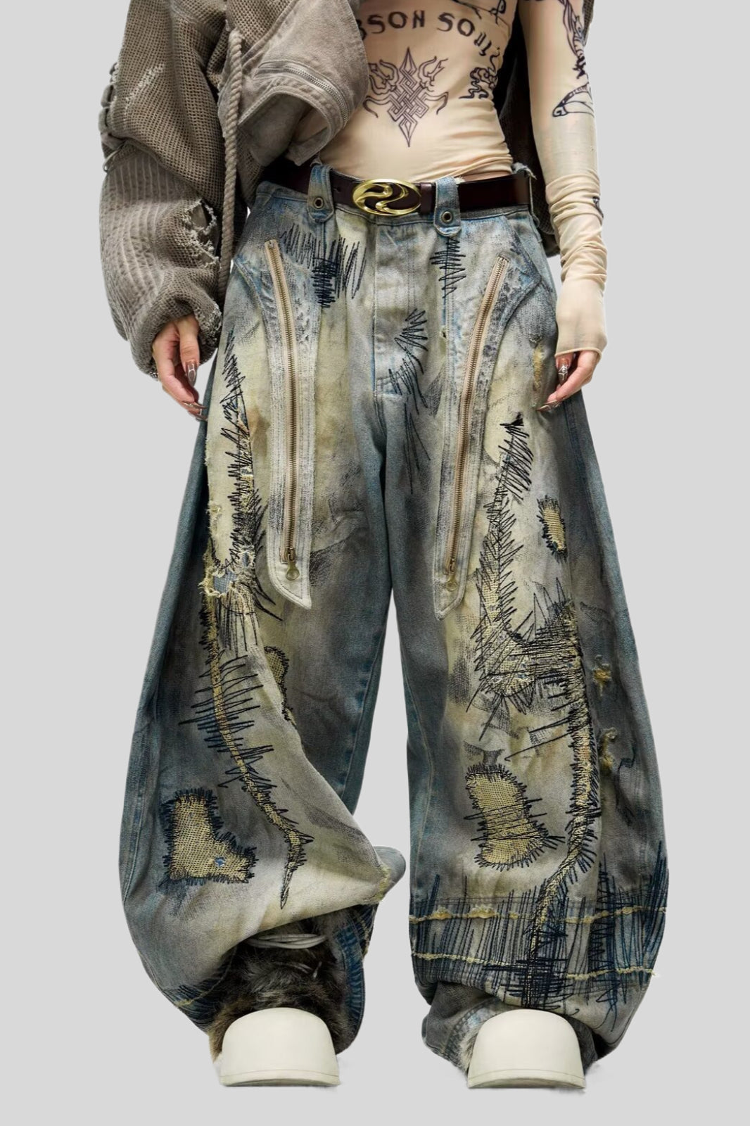 Stitch-Detail Distressed Barrel-Leg Jeans with Embroidery