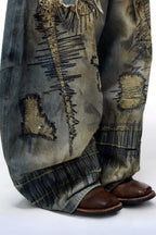 Stitch-Detail Distressed Barrel-Leg Jeans with Embroidery