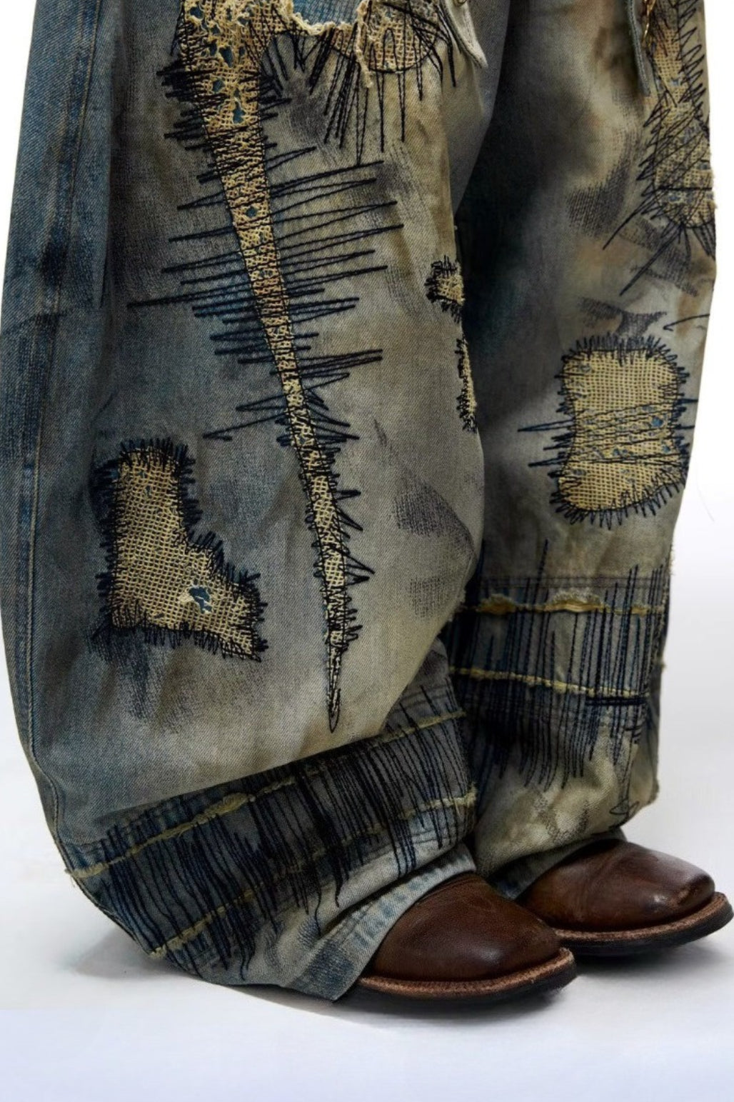 Stitch-Detail Distressed Barrel-Leg Jeans with Embroidery