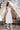 Polka-Dot Open-Back Dress with Halter Neckline Secondary image