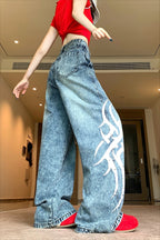 Distressed Straight-Leg Jeans with Print Details