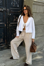 Plunging V-Neck Cotton Blouse with Flared Sleeves