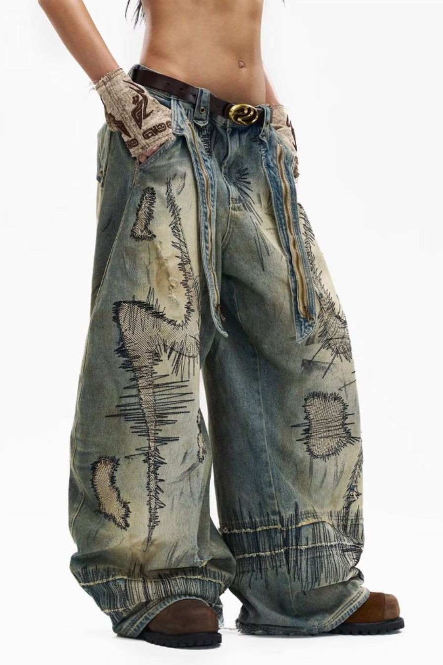 Stitch-Detail Distressed Barrel-Leg Jeans with Embroidery