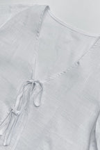 Plunging V-Neck Cotton Blouse with Flared Sleeves