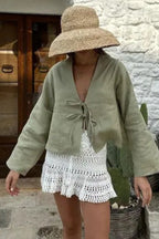 Plunging V-Neck Cotton Blouse with Flared Sleeves